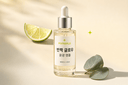PIXPARKLE Korean Hangul product label rendering: 반짝 글로우 윤광 앰플 on a slim K-beauty ampoule bottle in a lime-green chartreuse editorial product shot